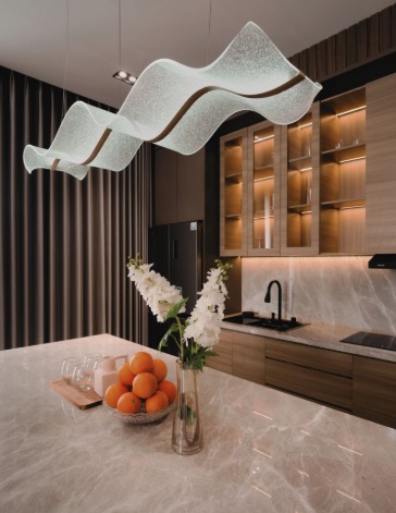 Kitchen with sculptural pendant light